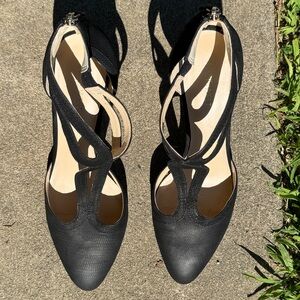 Nine West black leather heels with zipper back and strappy detail on top